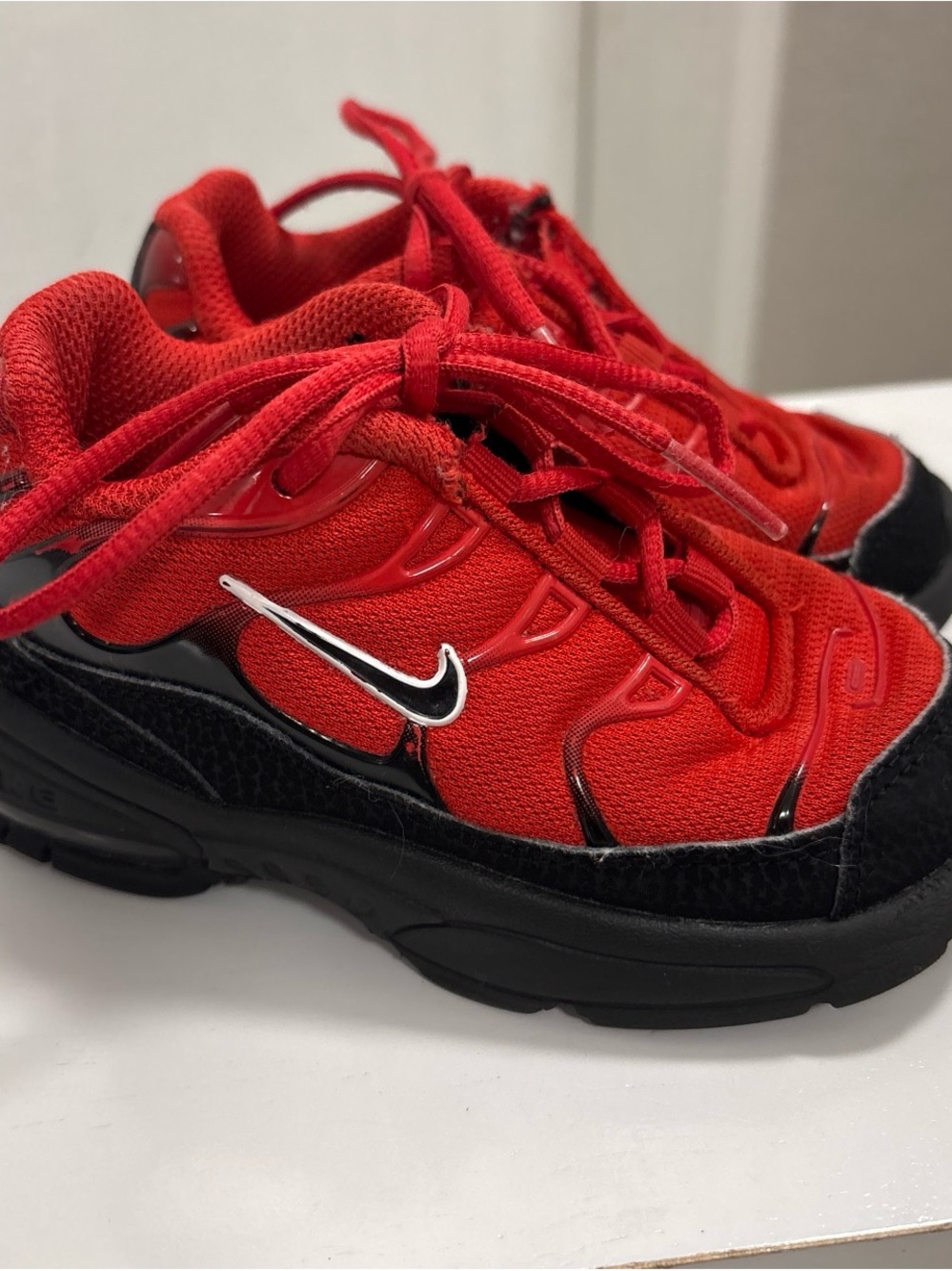 Nike Kids Red and Black Mesh Athletic Sneakers with Swoosh